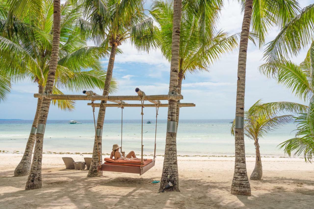 Oceanica Resort Panglao, Bohol Εξωτερικό φωτογραφία A swing at the beach